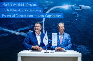 Oliver Burkhard (left) and Friedrich Lürssen sign an agreement to cooperate on the construction of the future F127 frigates. Photo: thyssenkrupp Marine Systems / NVL Group