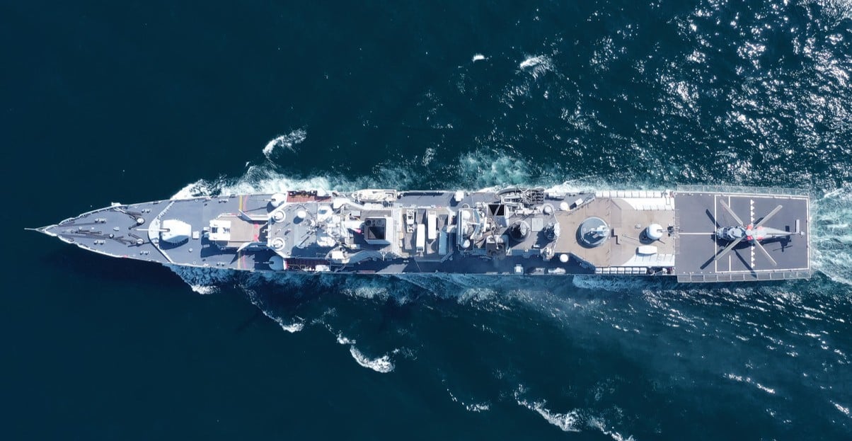 Aerial view of naval ship, battle ship, warship, Military ship resilient and armed with weapon systems, though armament on troop transports. support navy ship. Military sea transport 1345102641